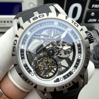 Elevate your collection with the Roger Dubuis Excalibur Spider RDDBEX0545, a bold statement of Swiss haute horlogerie and motorsport-inspired design. Designed for the modern connoisseur who craves both visual drama and mechanical mastery, this 45mm timepiece features a fully skeletonized dial, exposing every intricate detail of the in-house RD509SQ flying tourbillon movement. The iconic open framework, paired with a vibrant red-accented inner bezel and red DLC-coated crown, captures the adrenaline of the racetrack, while the lightweight grade 5 titanium case ensures comfort without compromising durability. Protected by an anti-reflective sapphire crystal, the watch offers crystal-clear visibility of the movement’s hand-finished bridges, gears, and the mesmerizing flying tourbillon at 6 o’clock. The integrated black rubber strap with a secure folding clasp provides a sporty, ergonomic fit, ideal for both formal occasions and active lifestyles.